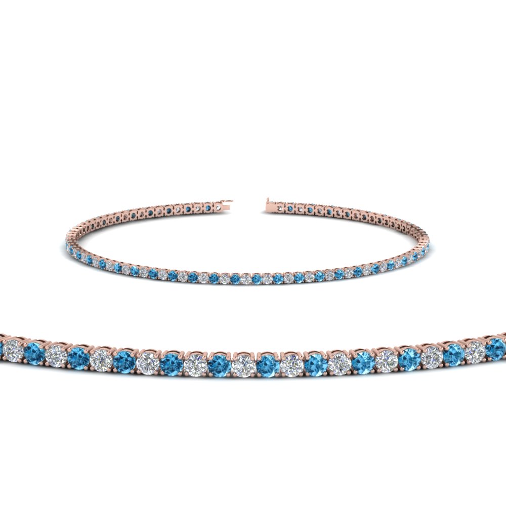 BLUE TOPAZ AND DIAMOND BANGLE BRACELET | Frassanito Jewelers