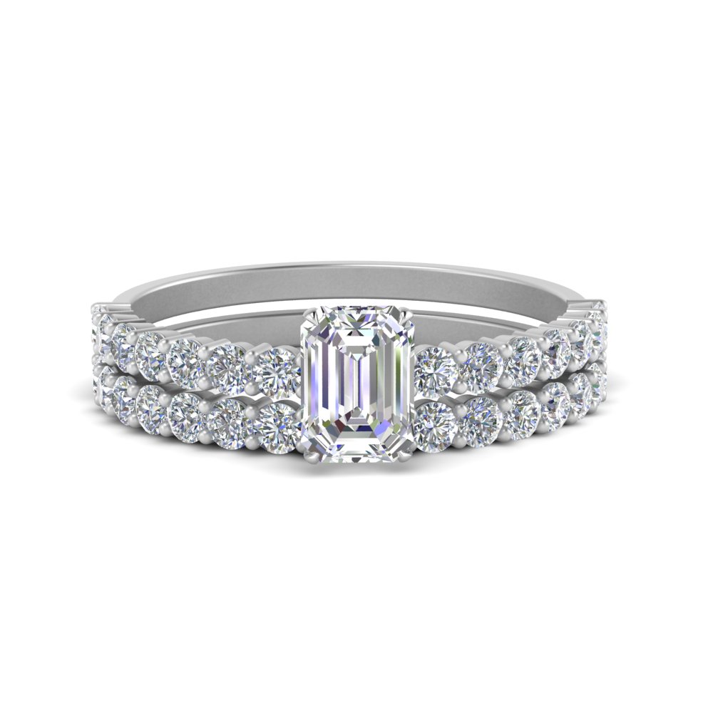 Delicate Emerald Cut Engagement And Wedding Ring Set In
