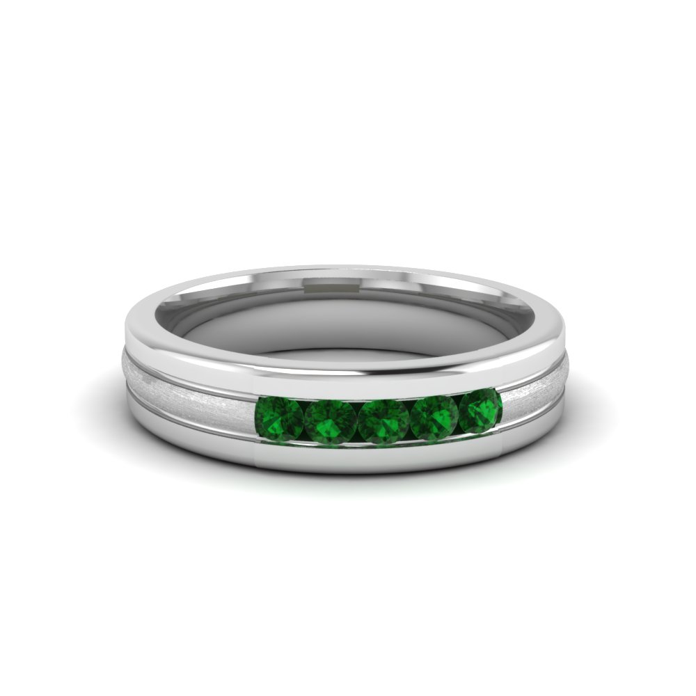 platinum ring with green stone