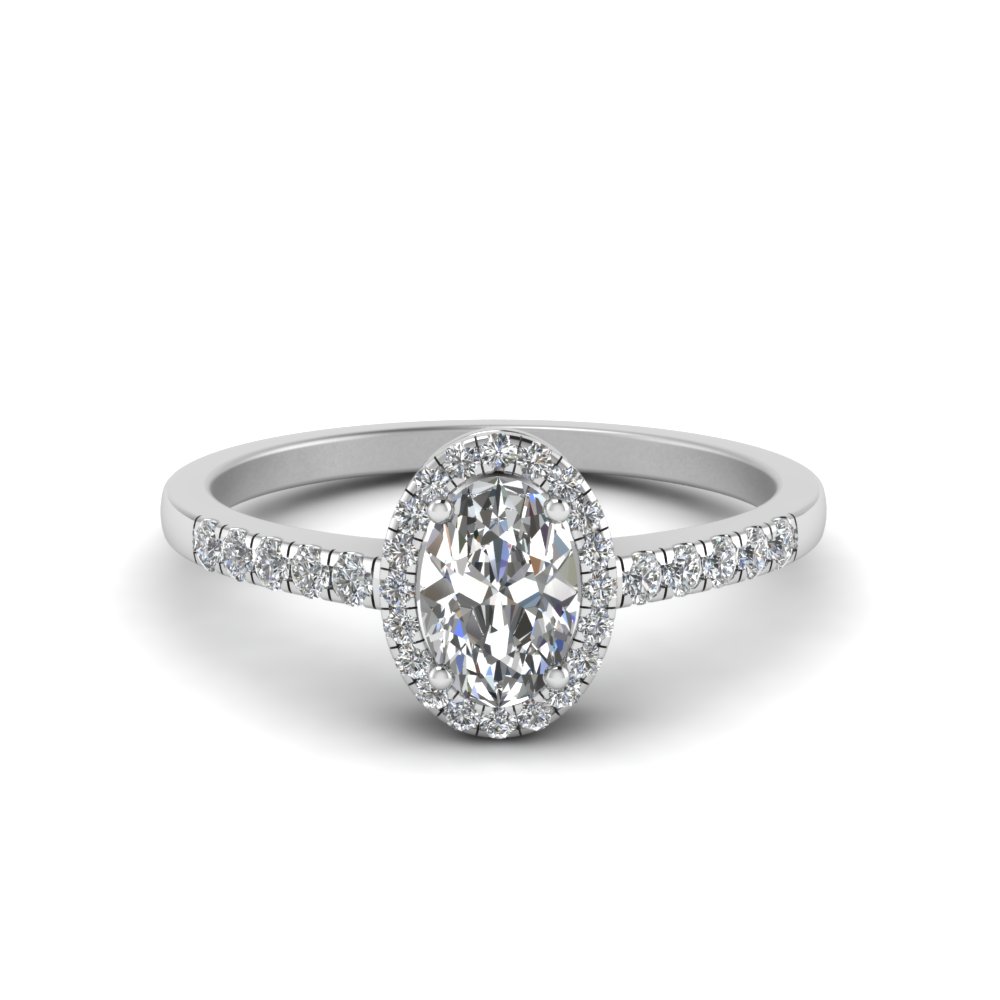 Delicate halo hot sale engagement ring