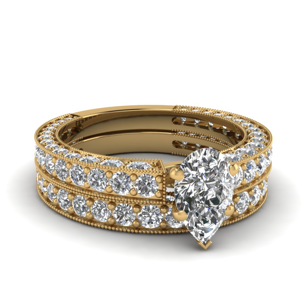 Pear Shaped Diamond Wedding Ring Set In 14K Yellow Gold