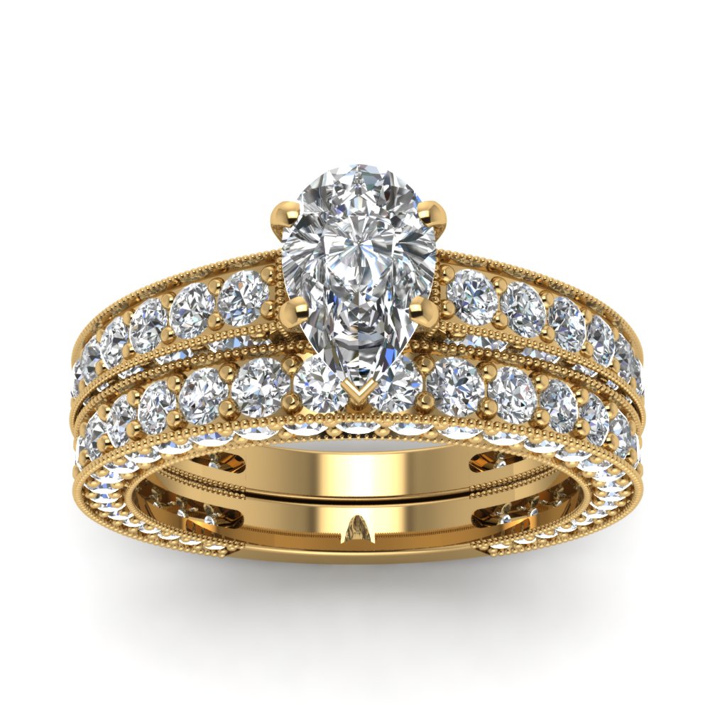 Pear Shaped Diamond Wedding Ring Set In 14K Yellow Gold