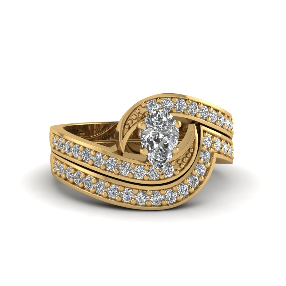 pear shaped swirl engagement ring and matching band in 14K yellow gold FDENS3006PE NL YG