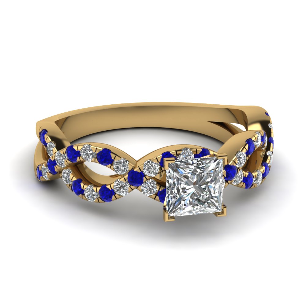 blue and gold engagement ring
