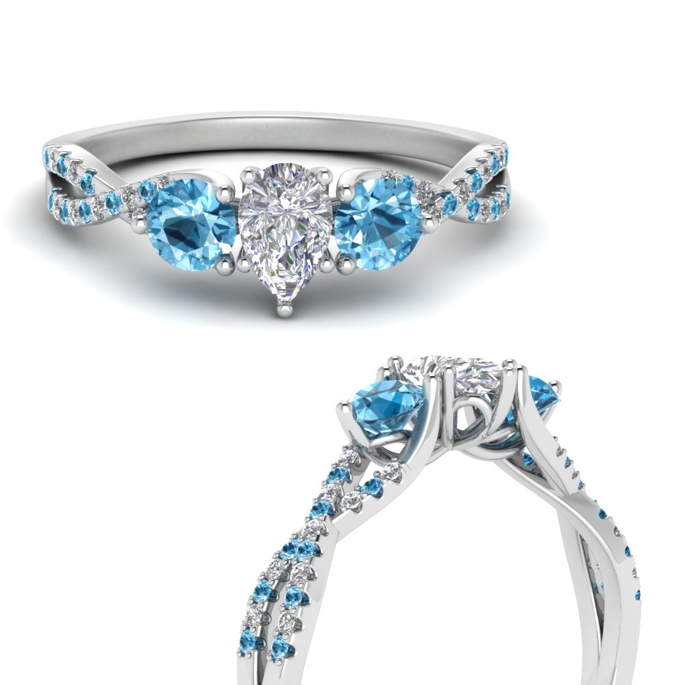 Pear Shaped Trellis Twisted 3 Stone Ring with Ice Blue Topaz in 14K White Gold
