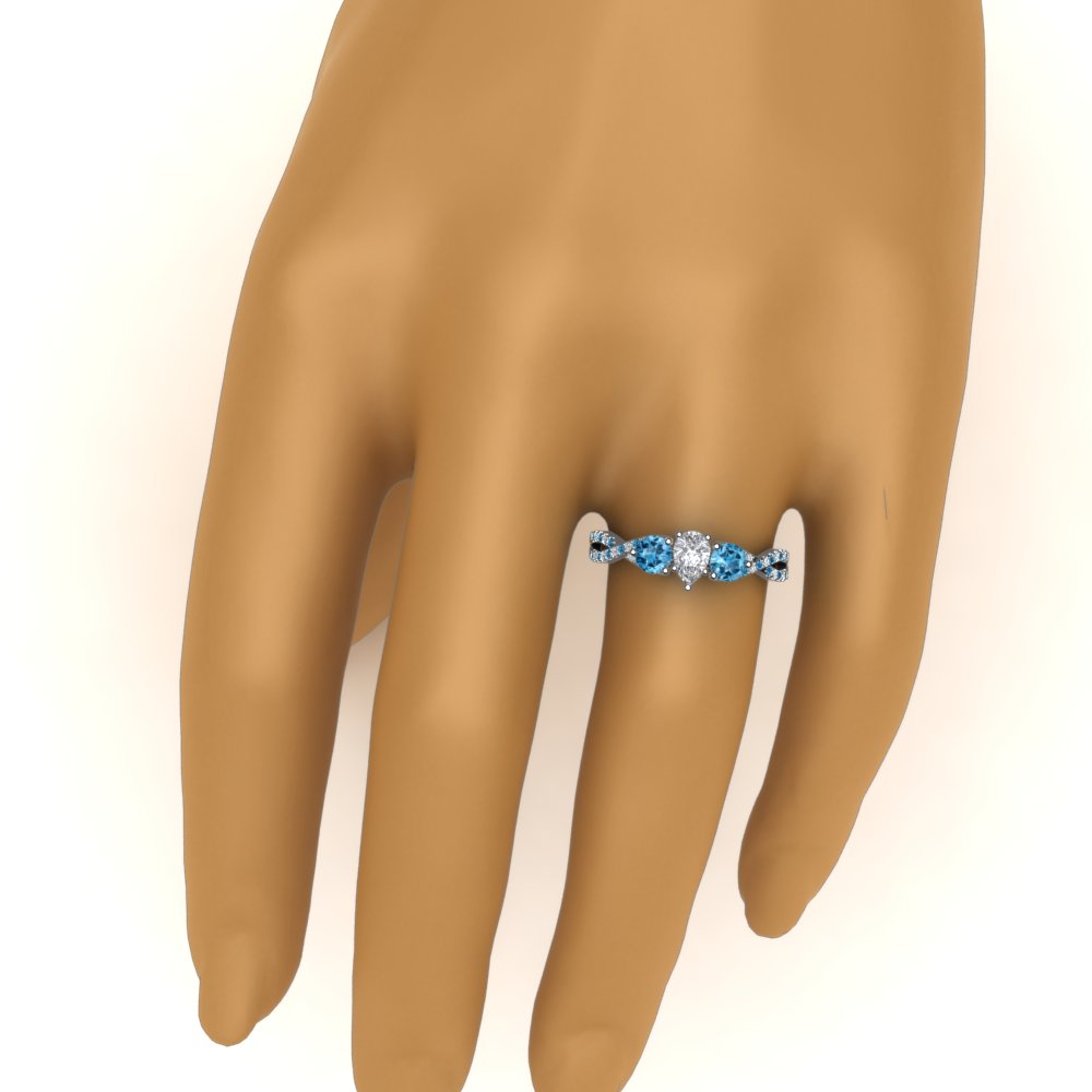 Pear Shaped Trellis Twisted 3 Stone Ring with Ice Blue Topaz in 14K White Gold