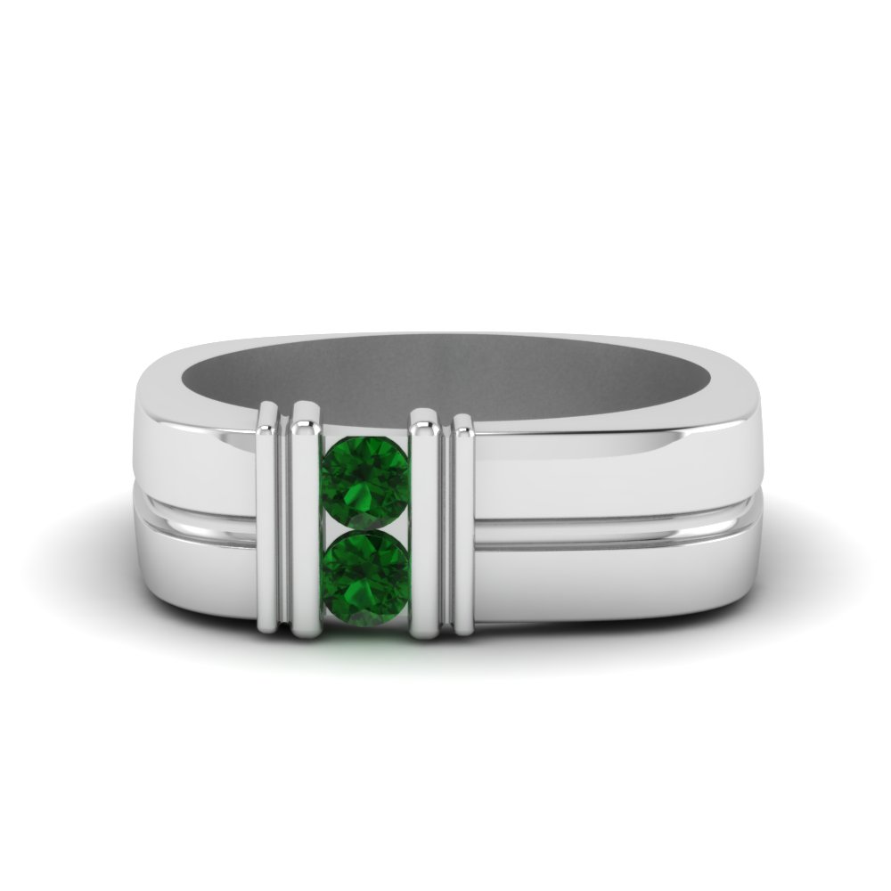 platinum ring with green stone